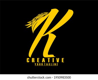 logo font with decorative wings. gold color logo.