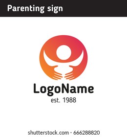 Logo in the form of hands holding a child, for action related to upbringing or helping children or young mothers
