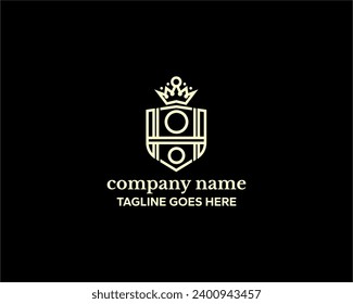 The logo is a gold shield and a crown. Suitable for logos for various types of companies or businesses, especially in the security sector.