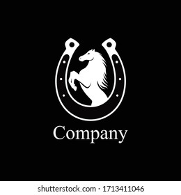 Logo horse standing combine horseshoe silhouette