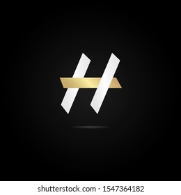 logo icon letter h simple and modern. luxury identity design with a combination of gold and white. black background. beautiful logo design for luxury corporate branding. vector