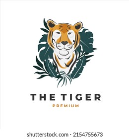 Logo illustration of a tiger behind a plant