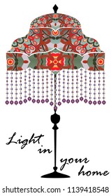  The logo with the image of an antique table lamp in various colors