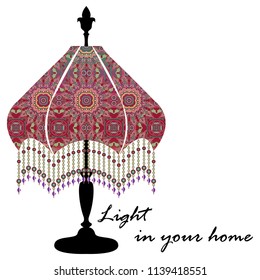  The logo with the image of an antique table lamp in various colors