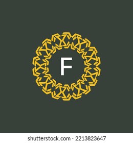 letra F de las iniciales del logotipo. emblema de círculo con un patrón étnico. logotipo de ornamento redondo