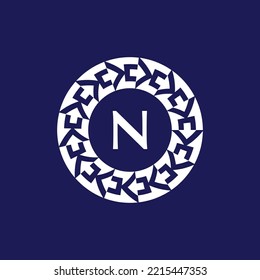 logo initials letter N. modern and elegant circle emblem. ornamental circular emblem. same pattern emblem