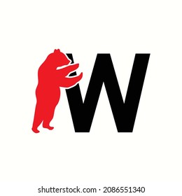 logo letter w with icon bear stand up vector design