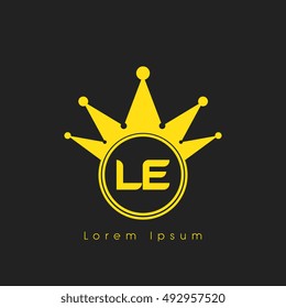 Logo letters L and E yellow crowned. Crown logotype design template on black background