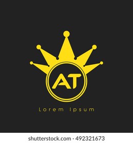 Logo letters A and T yellow crowned. Crown logotype design template on black background