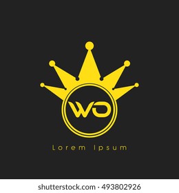 Logo letters w and o yellow crowned. Crown logotype design template on black background