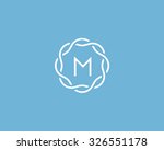 Logo - monogram in a contemporary style. Interlocking of two objects