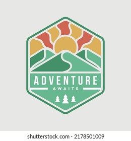 Logo for outdoor adventure travel badge with mountain landscape.