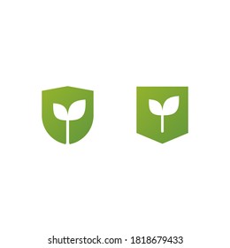 logo of plant bud with two small leaves inside shield shapes