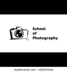 Logo for the school of photography. The camera is drawn in ink.