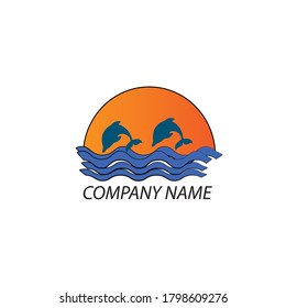 the logo is in the shape of a moon, there are dolphins and sea waves