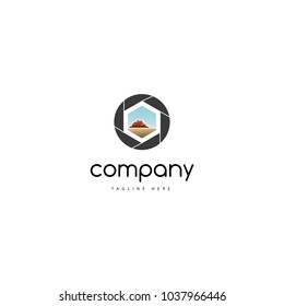 The logo shows a landscape in the camera shutter.