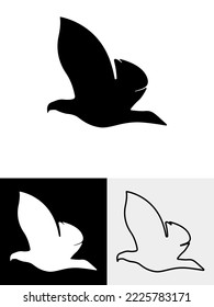 Logo silhouette of a dashing eagle flying with wings
