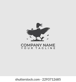 Logo silhouette of a duck playing in the mud happily. Vintage duck logo design.