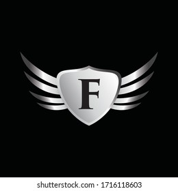 Logo of the silver alphabet letter F inside the winged shield. Vector design template elements for your application or corporate identity.