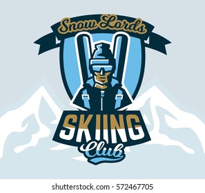 Logo skiing club. Emblem the skier in a cap and ski glasses, backpack and skis. Extreme winter sport. Isolated mountains in the background. Badges shield, lettering. Vector illustration.