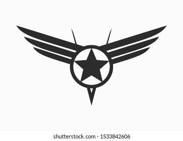 logo with a star symbol in the middle of a circle that has a pair of wings