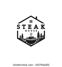The logo of the steak with the beautiful background of the yard