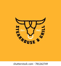 Logo steak house. Meat restaurant or butchery emblems. The stylized head of a bull and letters.
