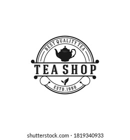 a logo suitable for a shop selling tea complete with leaves and a teapot