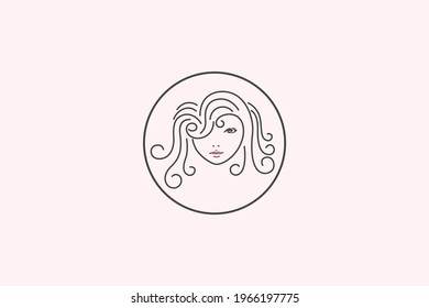 Logo or symbol of a beautiful woman's face in line art
