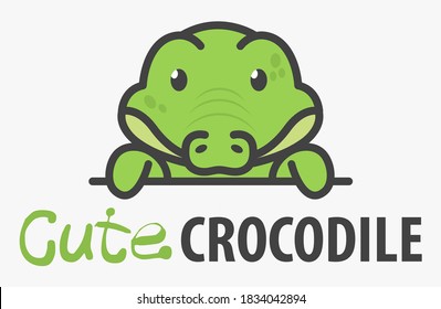Logo template with cute curious little crocodile. Vector logo design croc template for zoo, veterinary clinics, etc. Cartoon animal logo illustration.