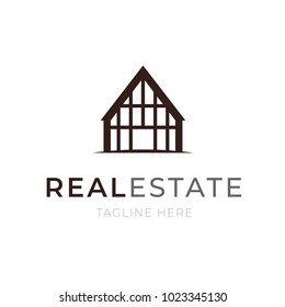 Logo template real estate concept. Apartment or house building icon rental business emblem. Corporate construction company symbol in thin line design, vector illustration.