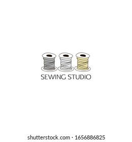 Logo, template for sewing workshop, Atelier, handmade workshop, fashion designer, garment industry, store. Spools of thread. Vector illustration hand drawing