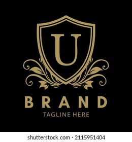 LOGO U IN GOLD COLOR SHIELD