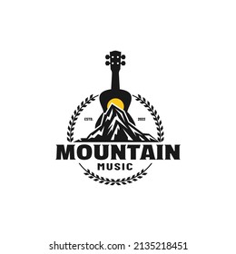 Logo Vintage illustration of classical guitar and mountain peak