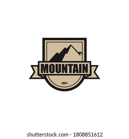 logo with vintage style design and there is a mountain