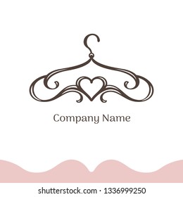 Logo for wedding boutique, women's dress shop, atelier. Vector template of the brand for the fashion designer. Vintage silhouette of a hanger made from lines and heart