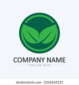 Logotipos de árbol verde y ecología hoja elemento de naturaleza vector