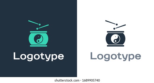 Logotype Chinese drum icon isolated on white background. Traditional asian percussion instrument Taiko or O-Daiko drum. Logo design template element. Vector Illustration
