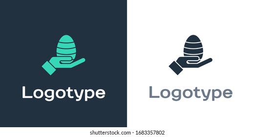 Logotype Human hand and easter egg icon isolated on white background. Happy Easter. Logo design template element. Vector Illustration