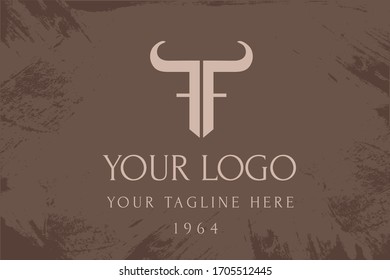 Letras de logotipo F y T. Blindaje en forma de toro