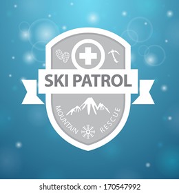 logotype mountain ski patrol rescue on blue background