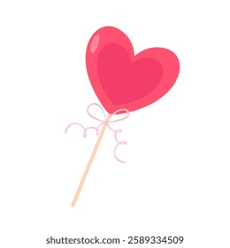 Lollipop on stick in heart shape in pink color with bow isolated on white background.