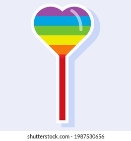A lollipop. Rainbow heart candy. Sticker on a light background.