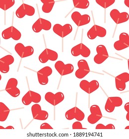 Lollipops on a stick of hearts.Vector seamless pattern red heart lollipops.