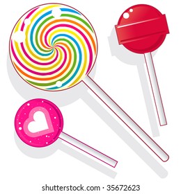 Lollipops and suckers.  Vector candy set includes spherical lolly pops as well as round swirl pop.