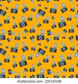 Lomography film camera on orange background vector seamless pattern