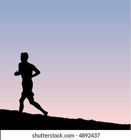 A Lone Male Runner On The Beach At Dawn