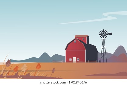 lonely barn and windmill. rural landscape