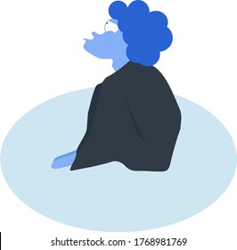 Lonely boy sitting wrapped in blanket. Loneliness in quarantine. 