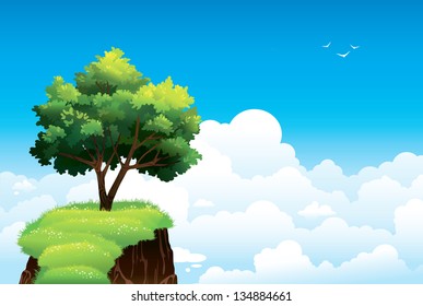 Lonely green tree and rock on a blue cloudy sky background.